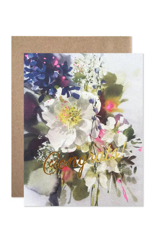 Congrats Bouquet By Helen Dealtry Card with a watercolor floral design in white, blue, green, and pink, featuring metallic gold foil script reading 'Congratulations!' and shown with a brown kraft envelope behind it on a white background. ©Hartland Cards