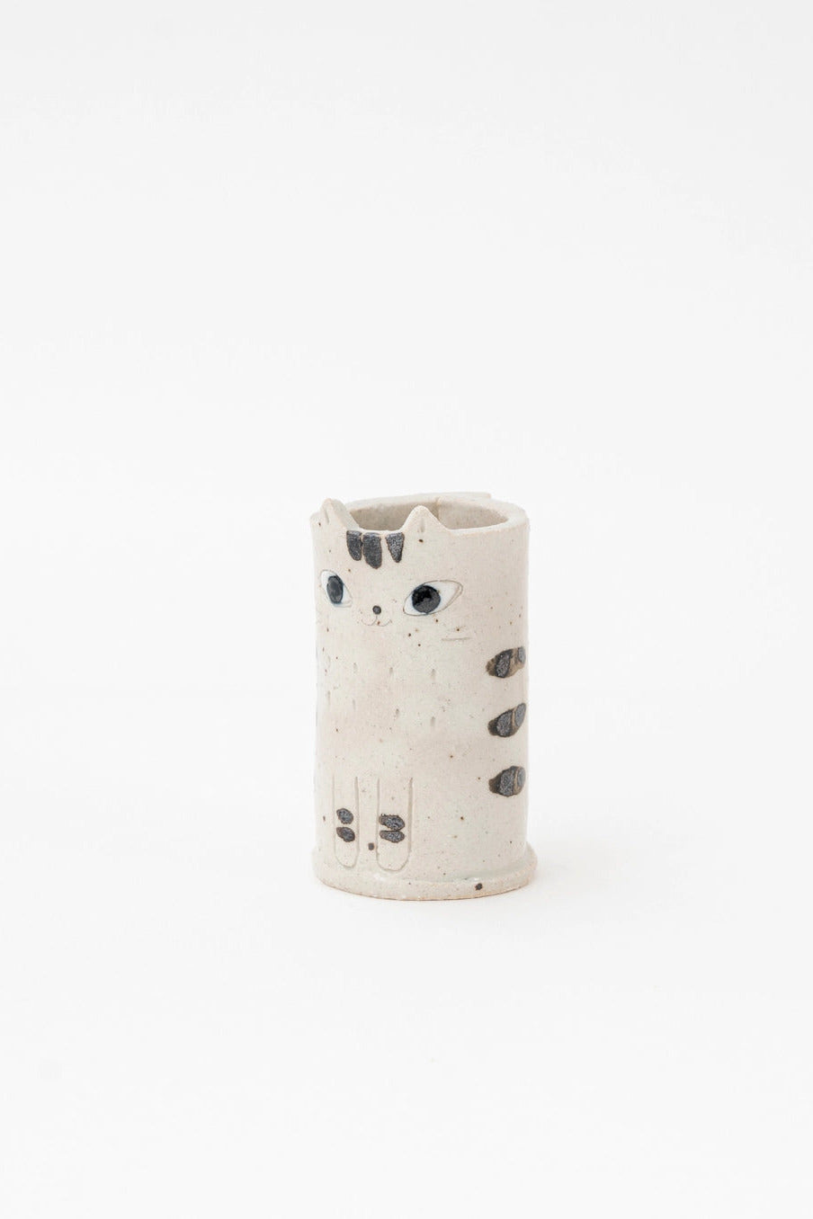 Cylindrical ceramic vase with black cat pattern on a white background ©Great Zakka