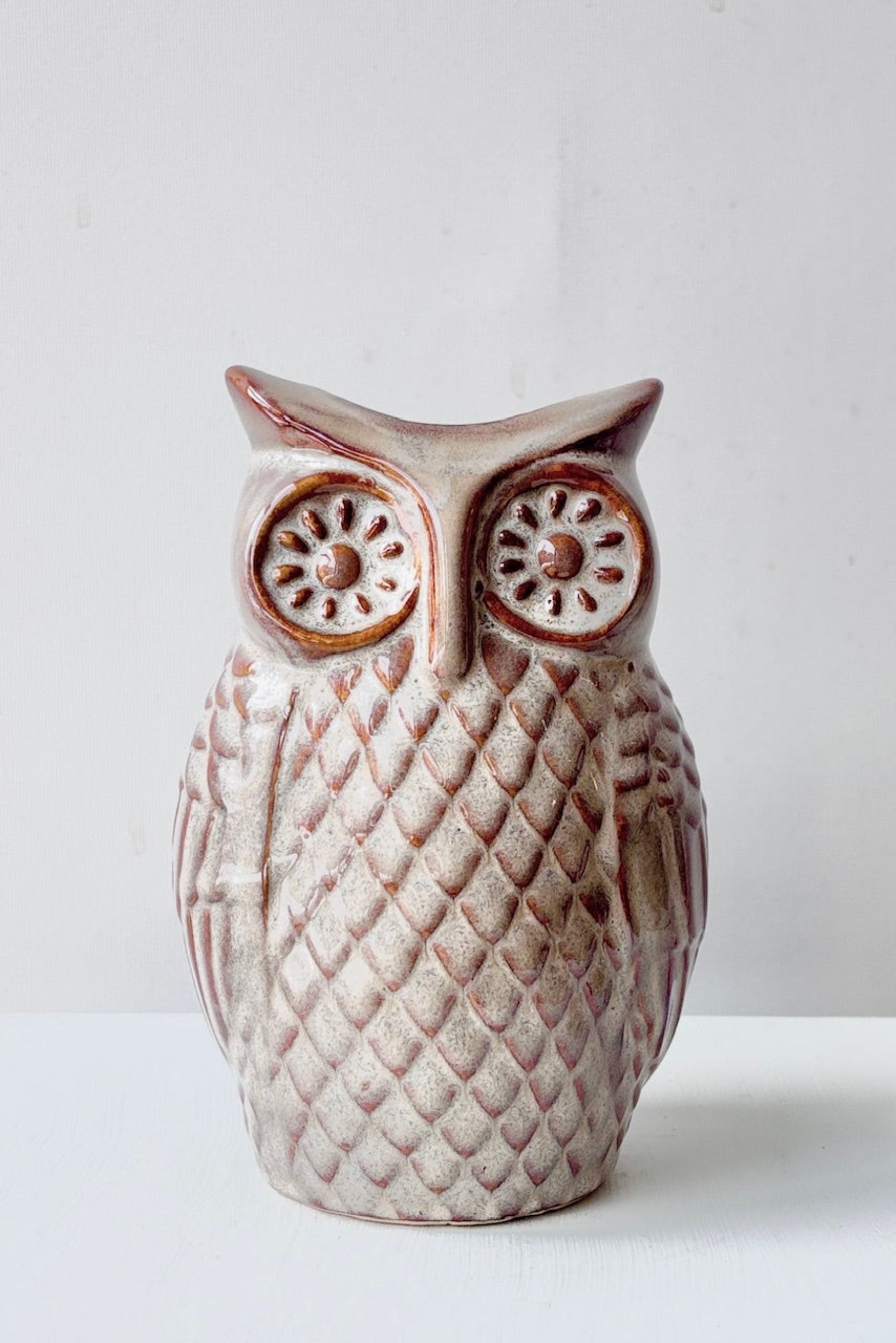 Ceramic owl-shaped vase on a white background ©Sprout Home