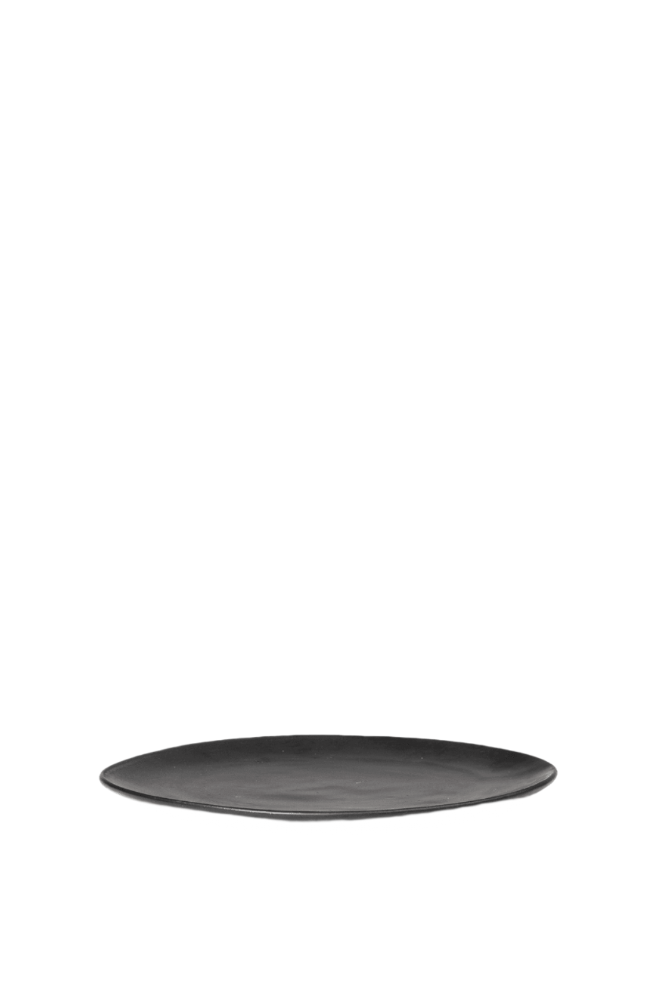 Medium sized Flow Plate in black laying flat.
