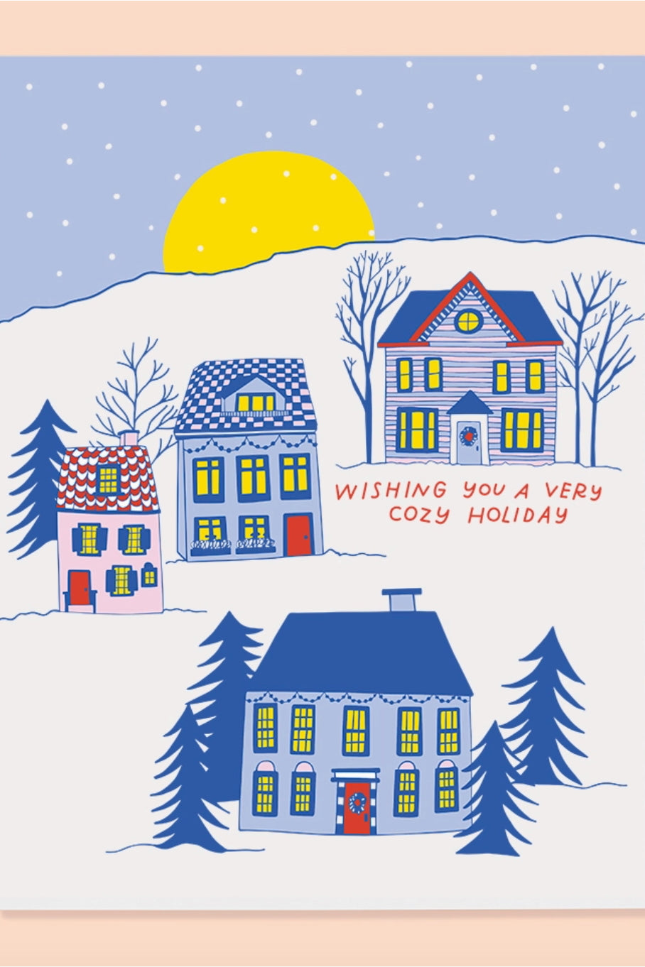 A greeting card illustrated with blue homes and trees in a snowy landscape. Red text reads "wishing you a very cozy holiday" ©The Good Twin