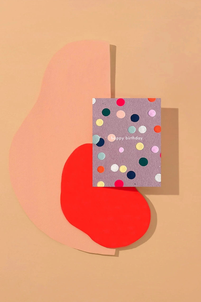 Birthday Dot Card by Moglea sitting on a graphic peach background