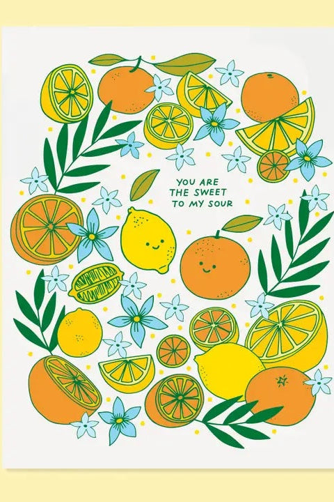 A colorful illustration of citrus fruits and flowers around the text "You are the sweet to my sour" ©The Good Twin