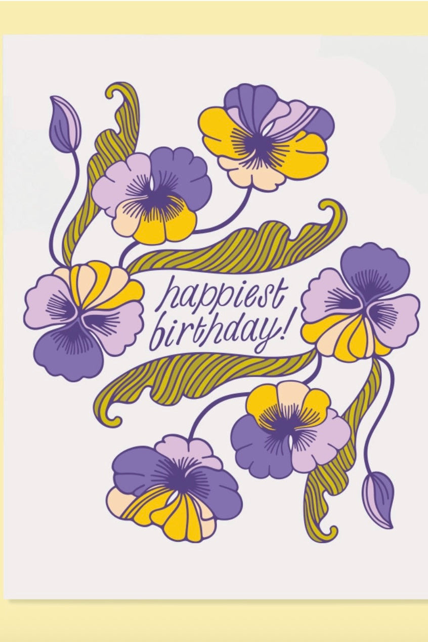 Image of yellow and purple flowers with the text "Happiest Birthday!" on a white background ©The Good Twin