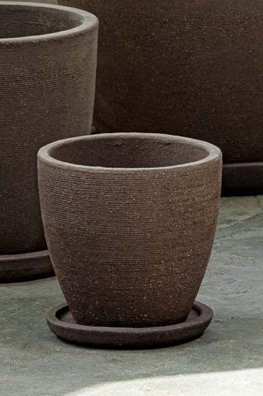 Small carob lara planter empty and in front of larger lara planters.