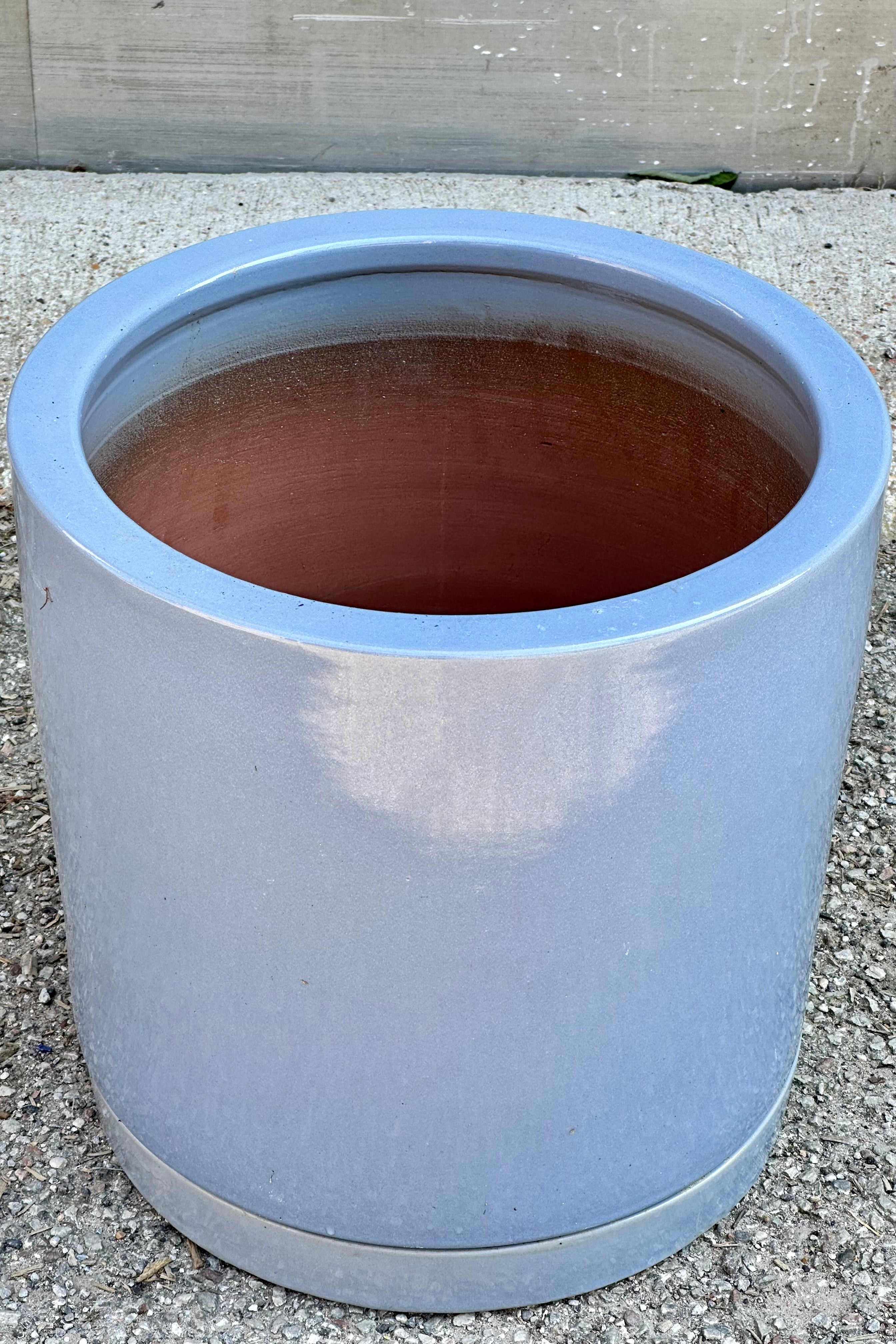 The Steel colored Cylinder planter looking from the topside in.