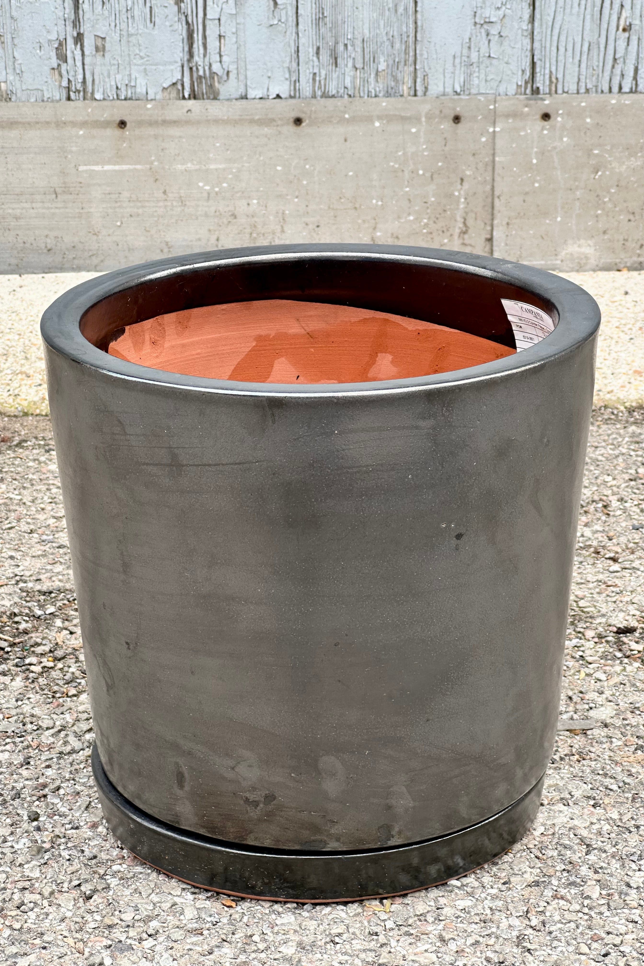I/O2 Graphite Cylinder Planter in Medium shown from the topside.