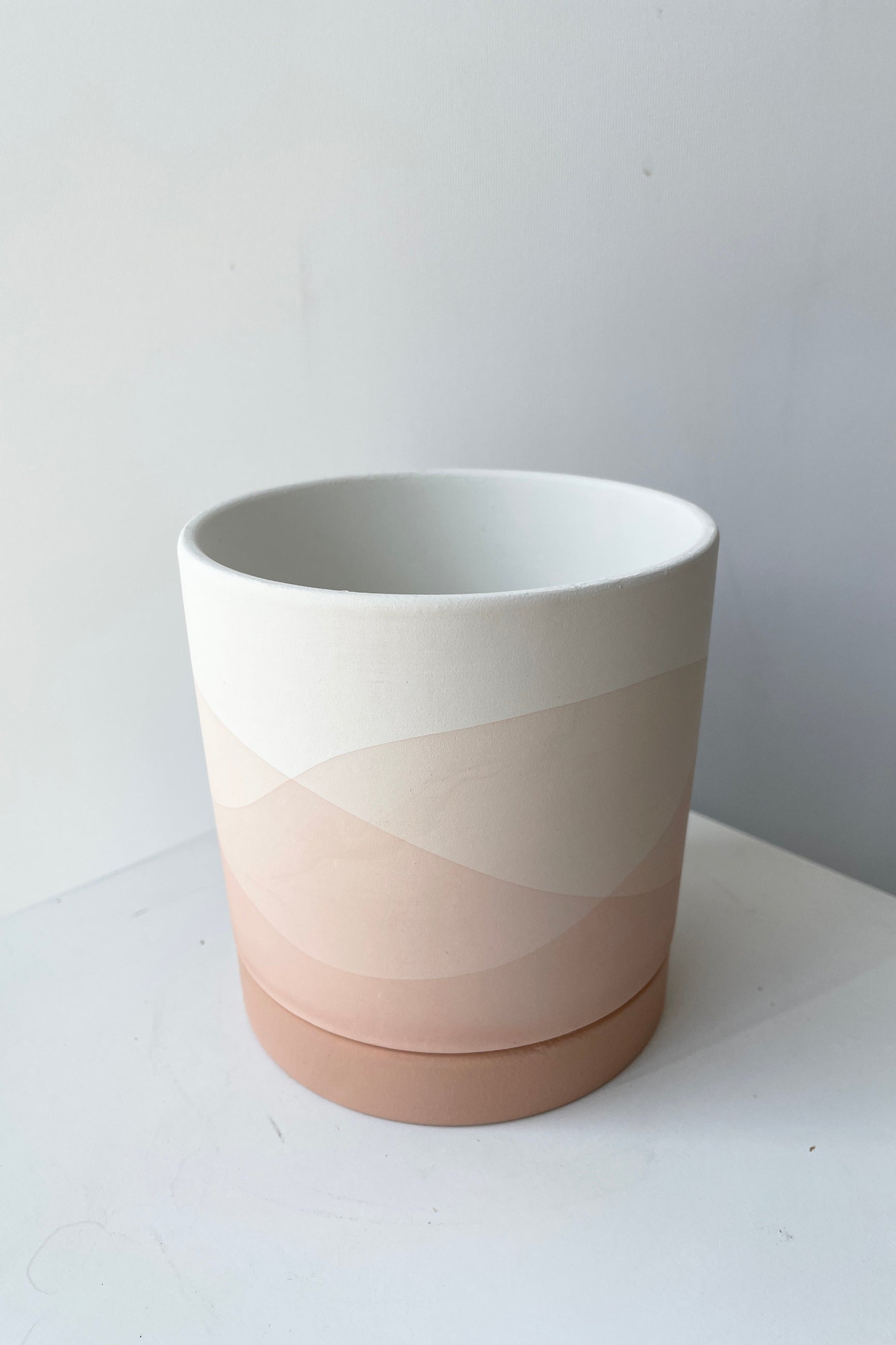 Vesper pot and saucer small shown from the top side looking in slightly ©Sprout Home