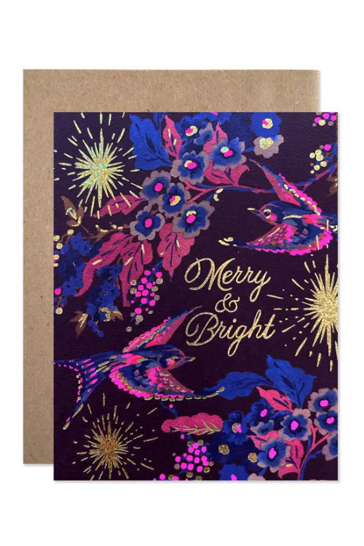 Greeting card with floral design and 'Merry & Bright' text on a purple background ©Hartland Cards
