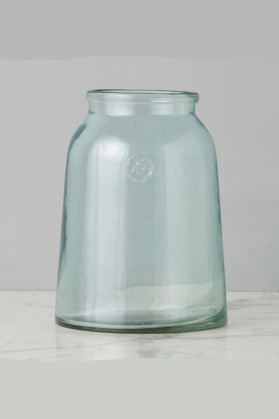 Clear glass French Bee jar on a light gray background ©Etu Home