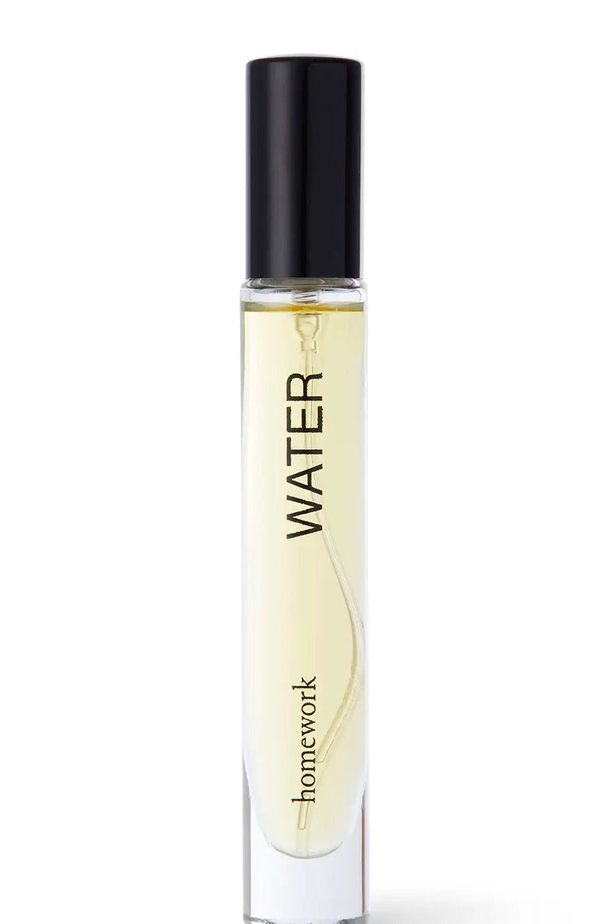Perfume bottle labeled 'Water' by 'homework' on a white background ©Homework