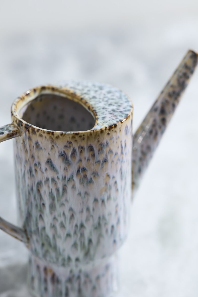 Ceramic Lucien pitcher with speckled pattern on a blurred background ©Accent Decor