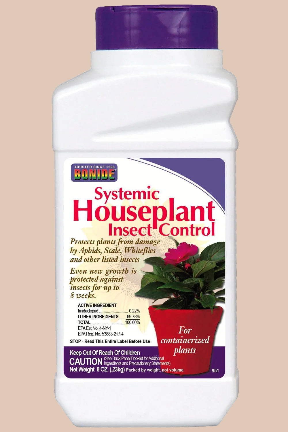Bottle of systemic houseplant insect control with purple cap on a white background ©Bonide