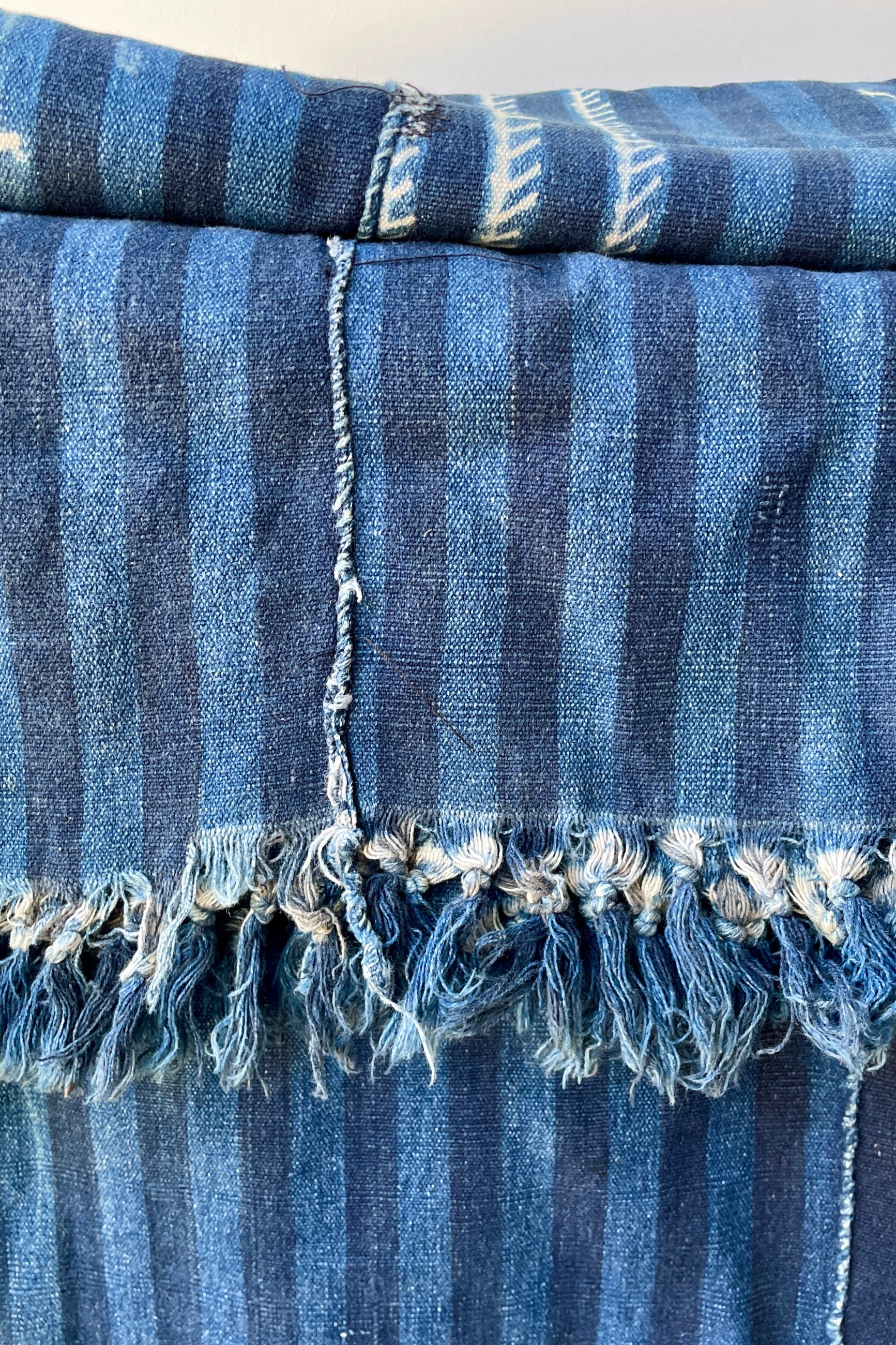 Indigo Tie-dye bud cloth showing the tassels ©Sprout Home