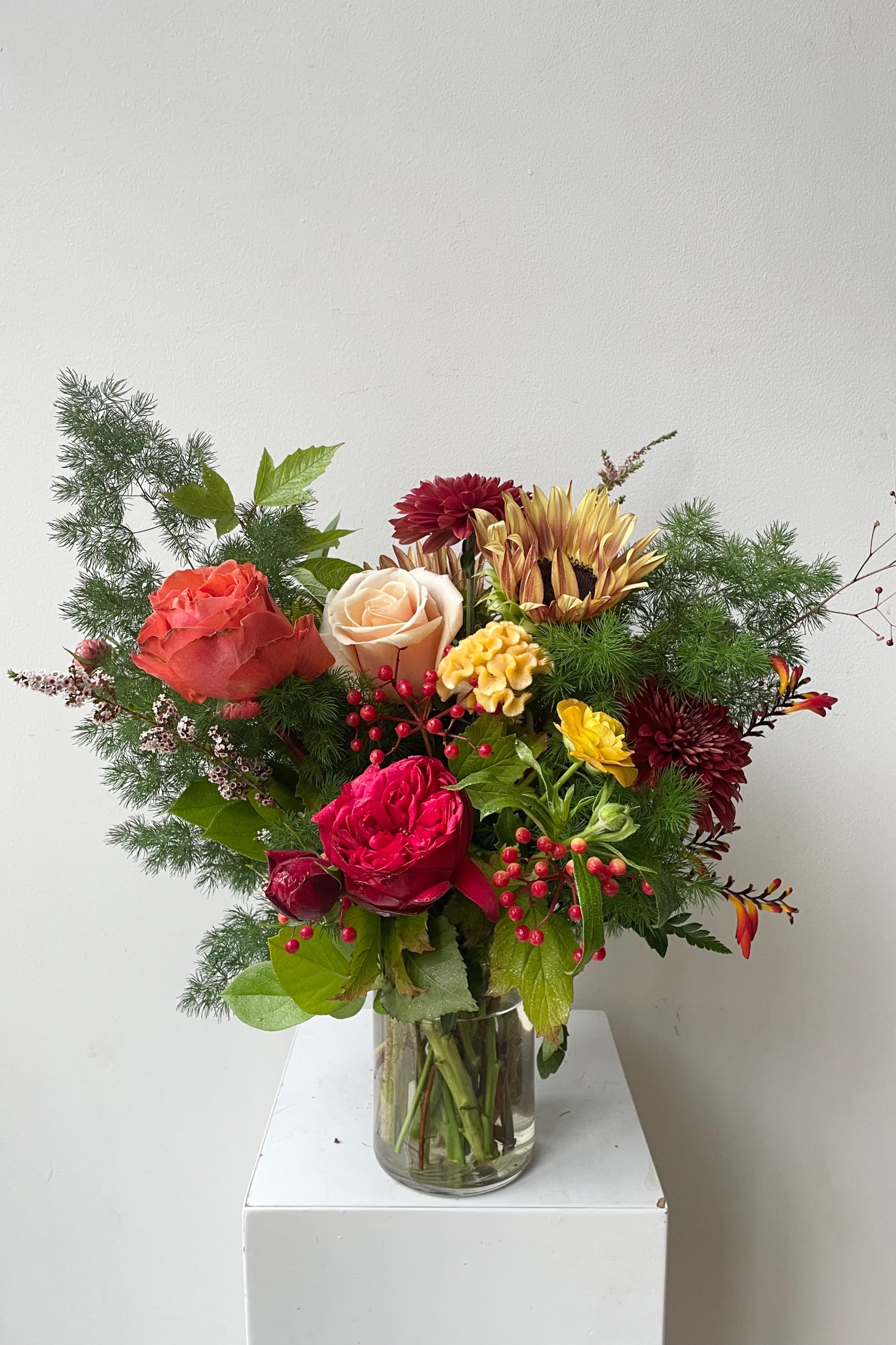 Custom Fresh Floral arrangement by Sprout Home in their Earth palette of warm reds, yellow and orange. ©Sprout Home #size_$130