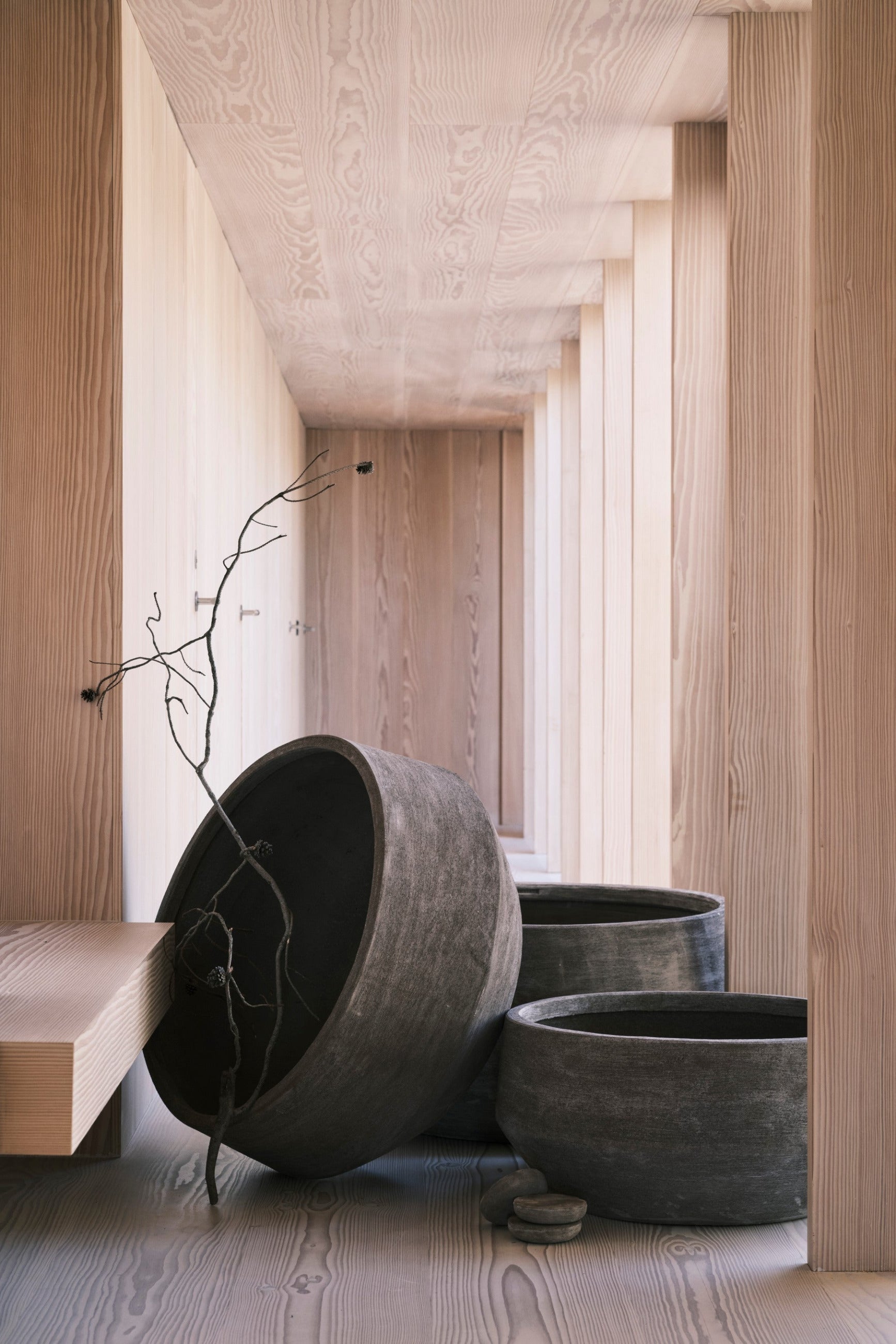 Three large Doma Grey pots in a room with wooden walls and a textured ceiling. ©Bergs Potter