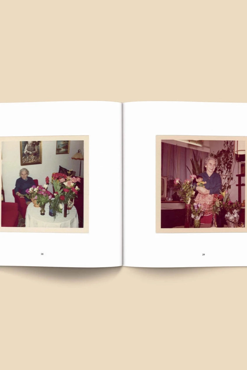 Forgotten Flowers Coffee Table Book by Broccoli open to pages with vintage photos