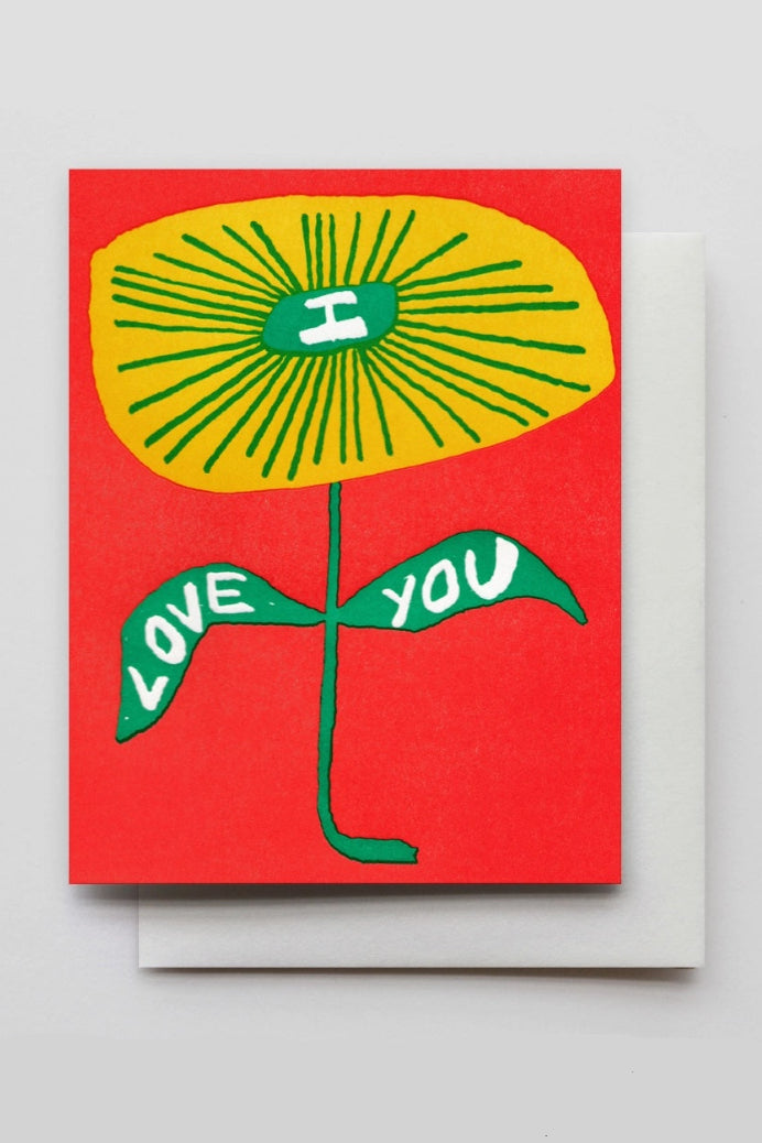 A red greeting card with a yellow floral graphic and the text "I Love You" ©Hammerpress