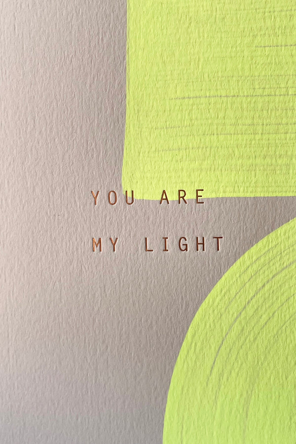 A detailed view of the front design of the You Are My Light card