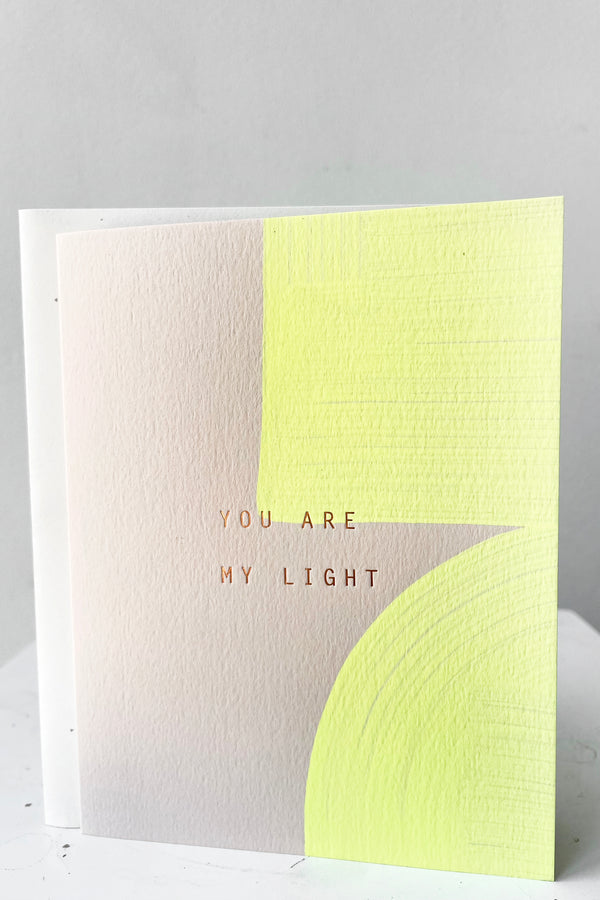 A full frontal view of You Are My Light Card with envelope against white backdrop
