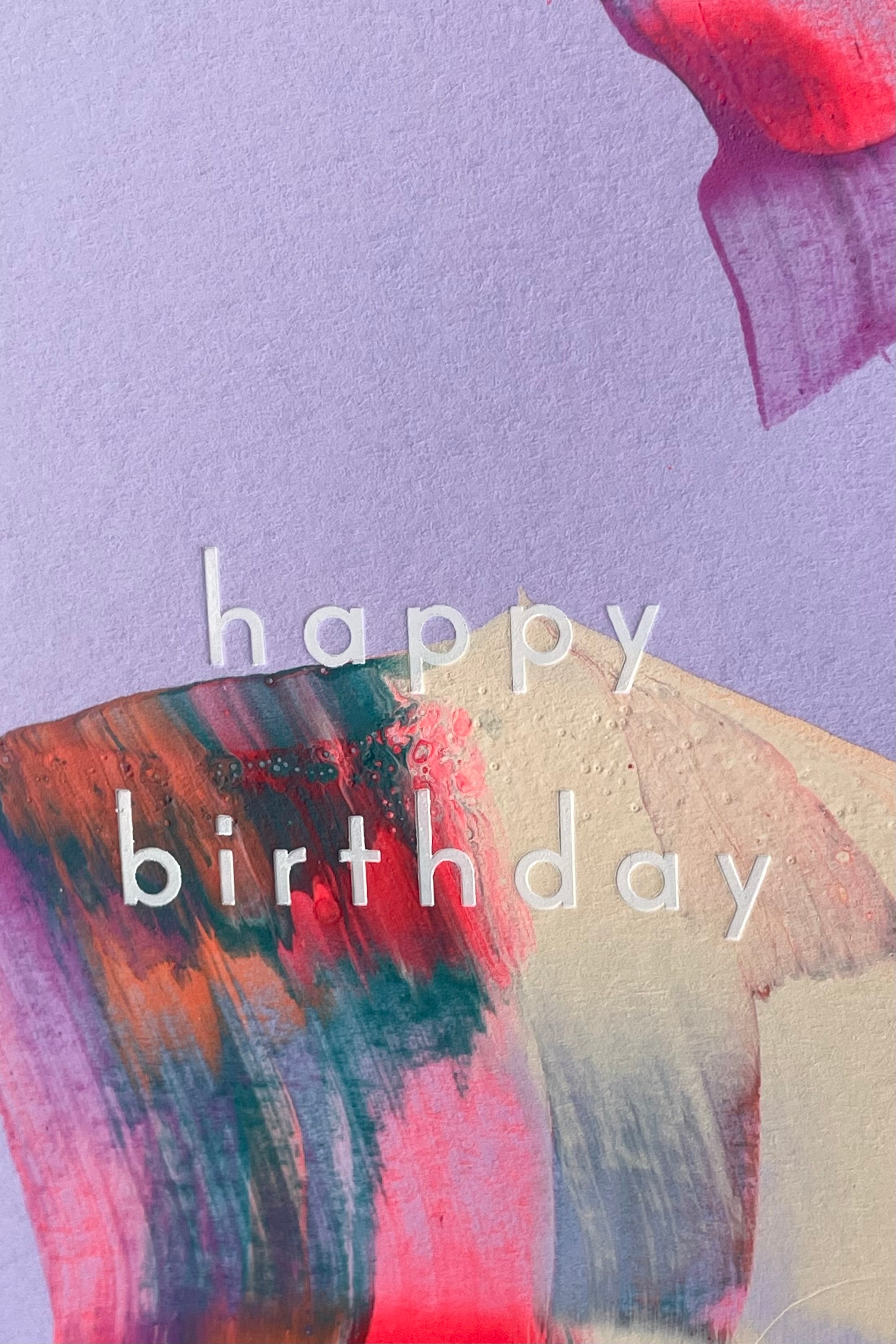 A detailed view of the front design on Orchid Birthday Card