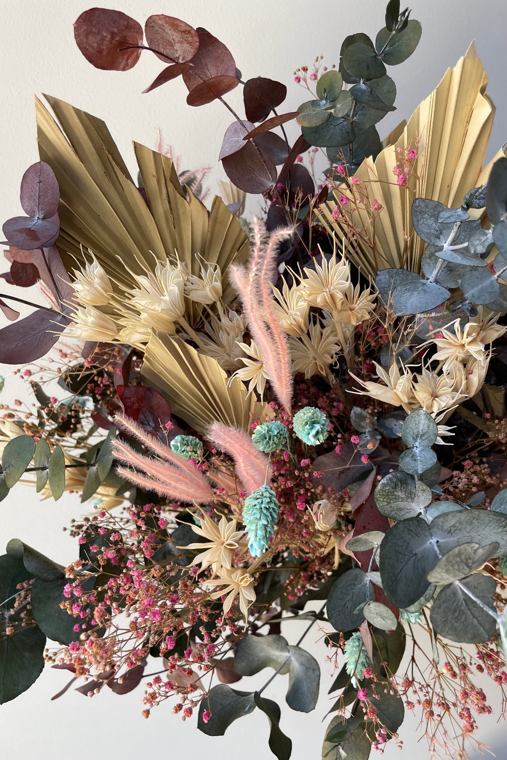 A detail of the 'Faerie' arrangement custom created by Sprout Home showing the mix of neutral and pastel floral components. ©Sprout Home #size_$200