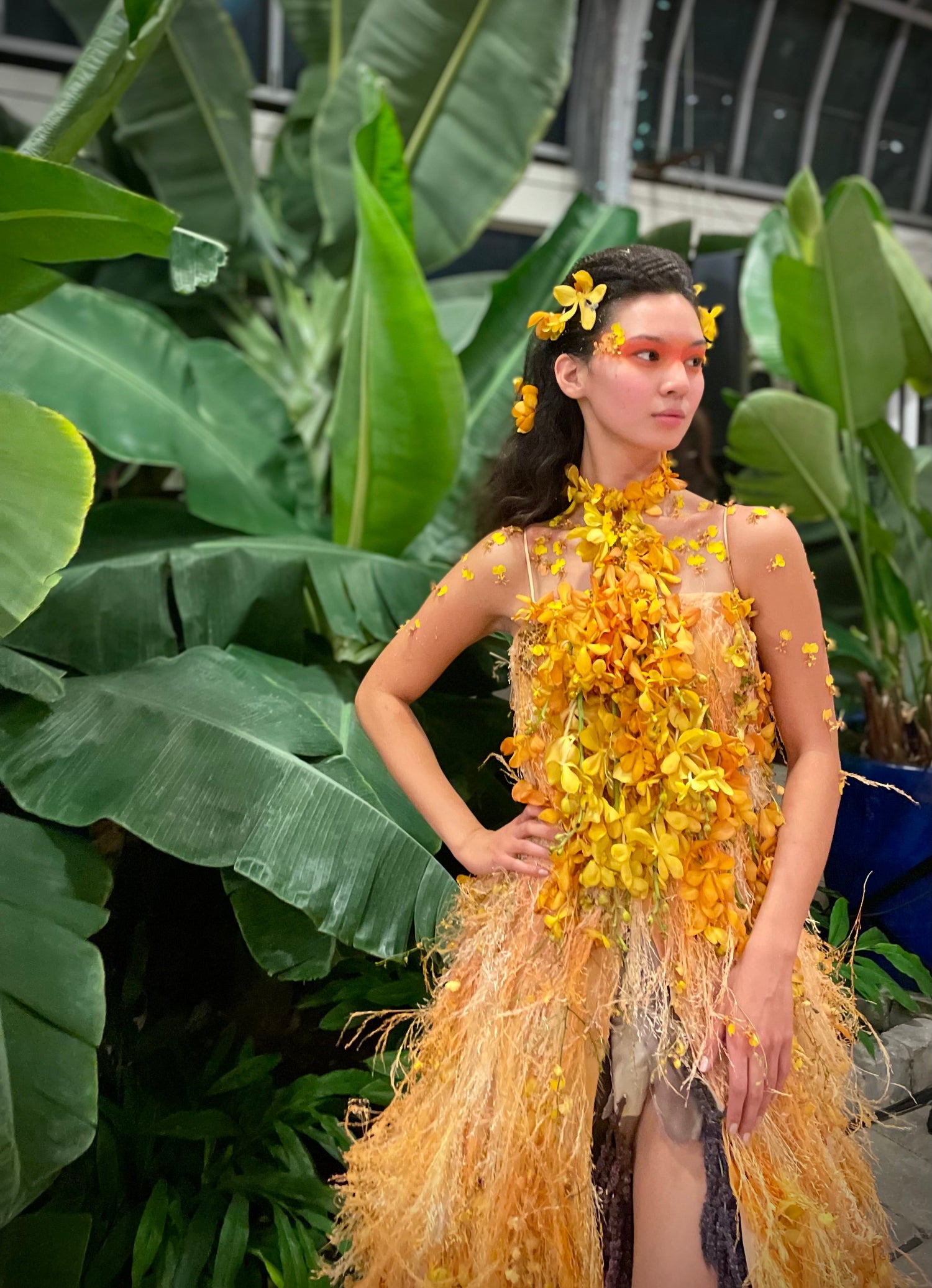 Fleurotica event at the Garfield Park. Yellow dress floral creation by SPROUT HOME. Made with orchids and dried papas and Ava grass. Photograph by Sprout Home.