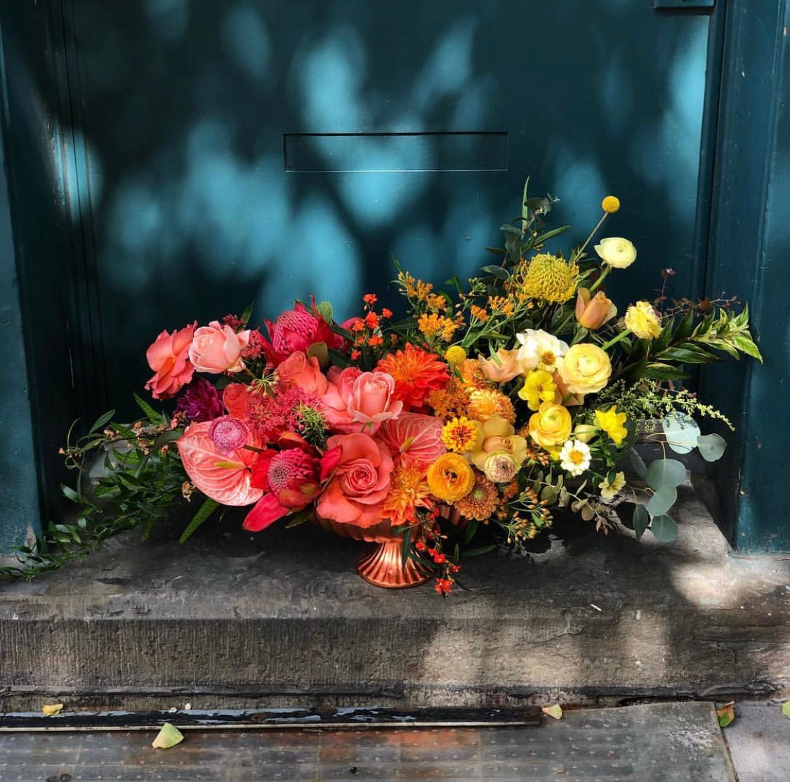 A bright and fun Gradient floral arrangement by SPROUT HOME. Photo by Sprout Home.