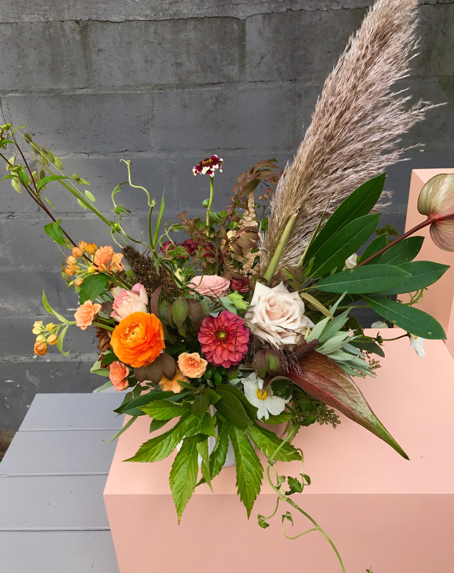 A fun fall arrangement featuring a pampas bloom by SPROUT HOME. Photo by Sprout Home.
