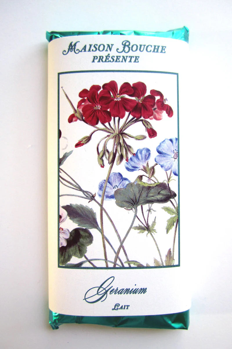 Maison Bouchee chocolate bar with floral design and text on a white background ©Maison Bouche