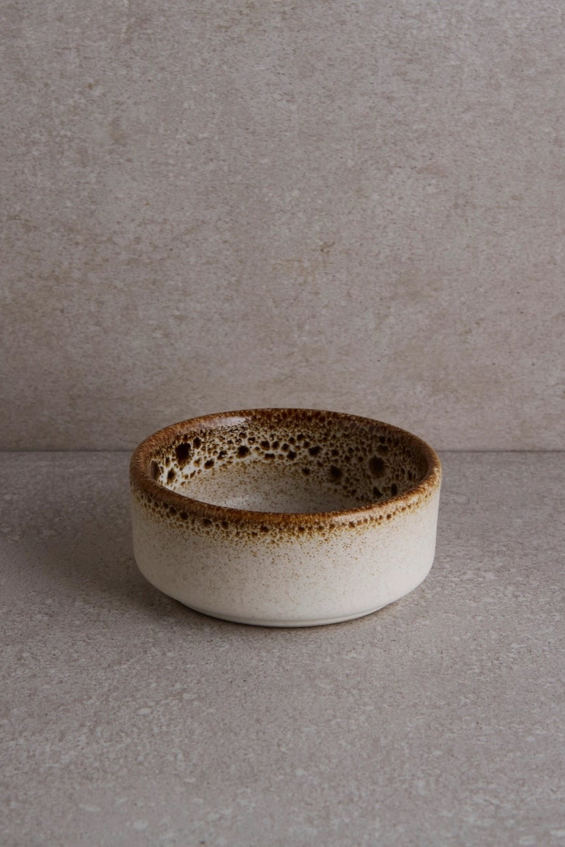 Brown Sauce Dish against a gray backdrop ©Goodies