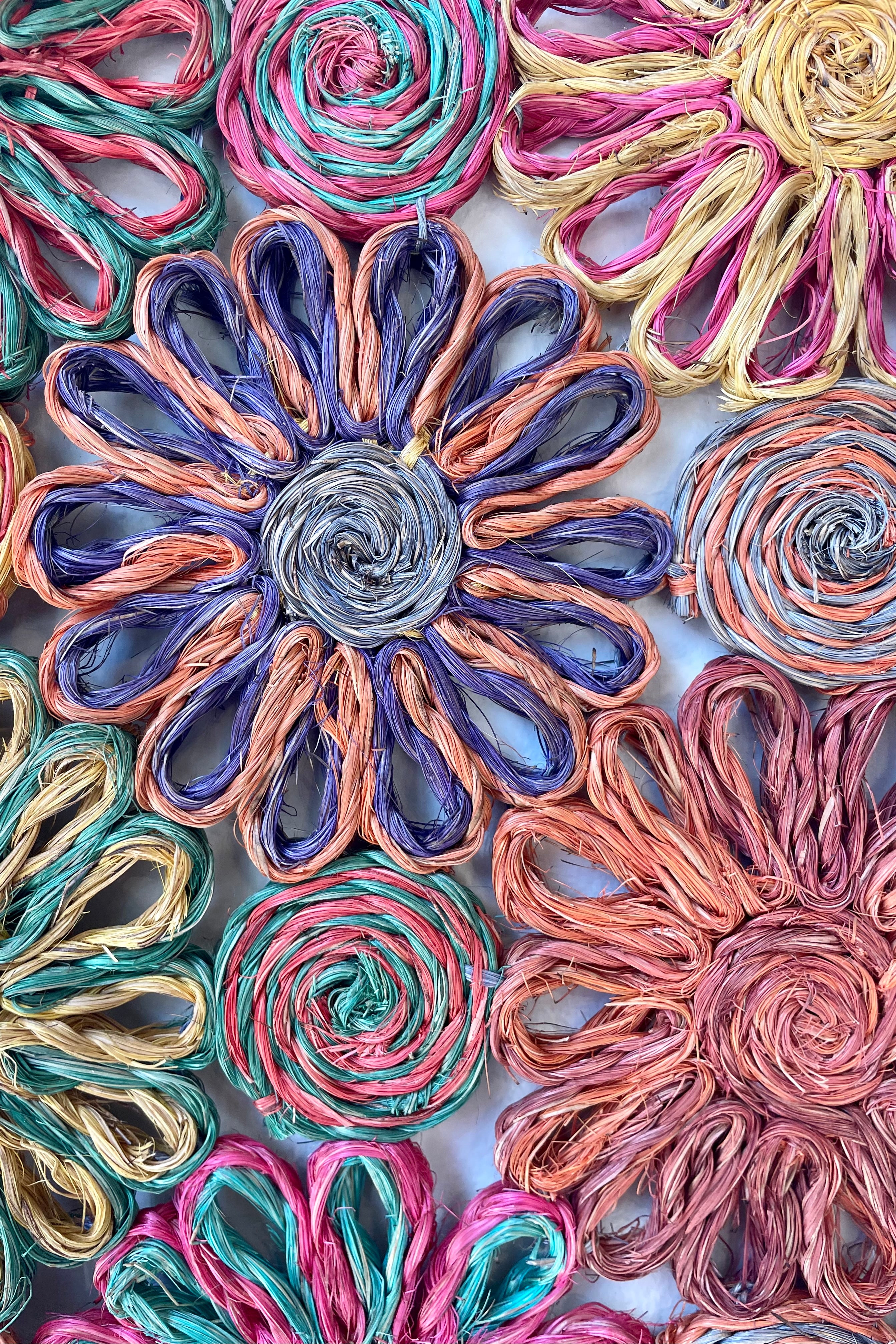 Photo of a colorful patchwork Daisy pattern Abaca placement