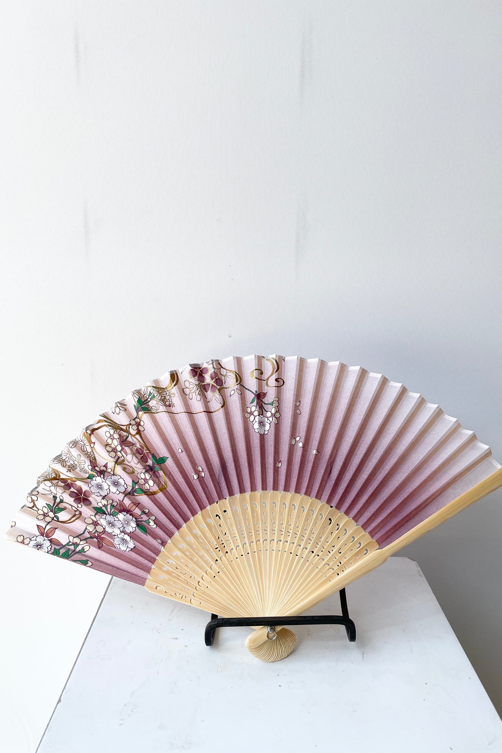 Silk fan sherry blossom pattern with gold at Sprout Home. ©Sprout Home