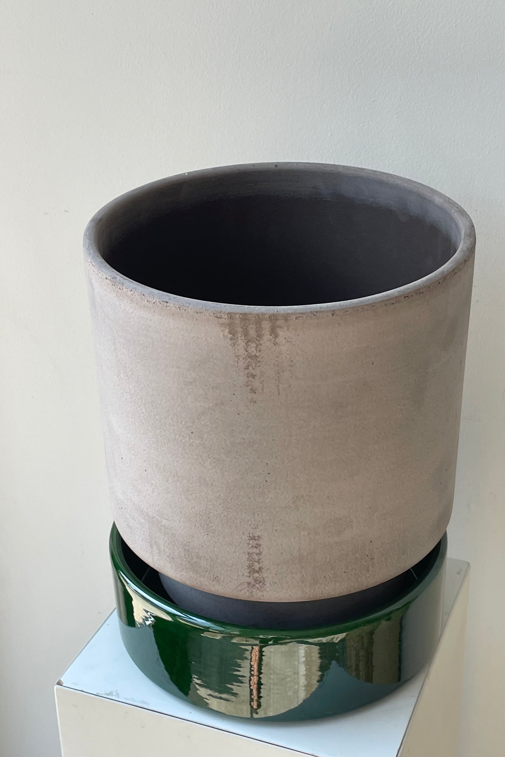 Grey and emerald 9.8 inch Hoff Pot by Bergs Potter on a white surface in a white room ©Sprout Home