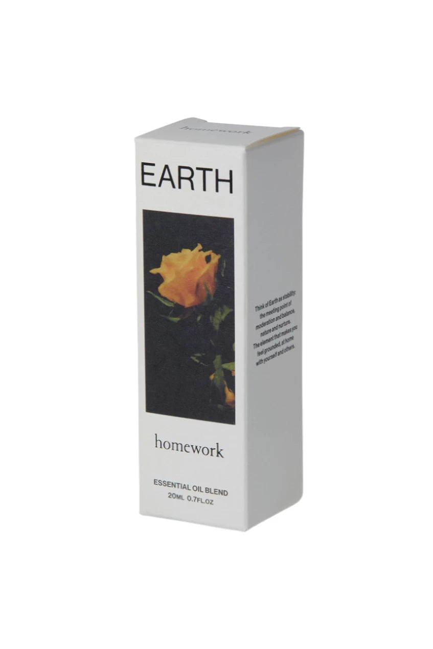 Earth essential Oil packaging showing a yellow rose on the front by Homework.
