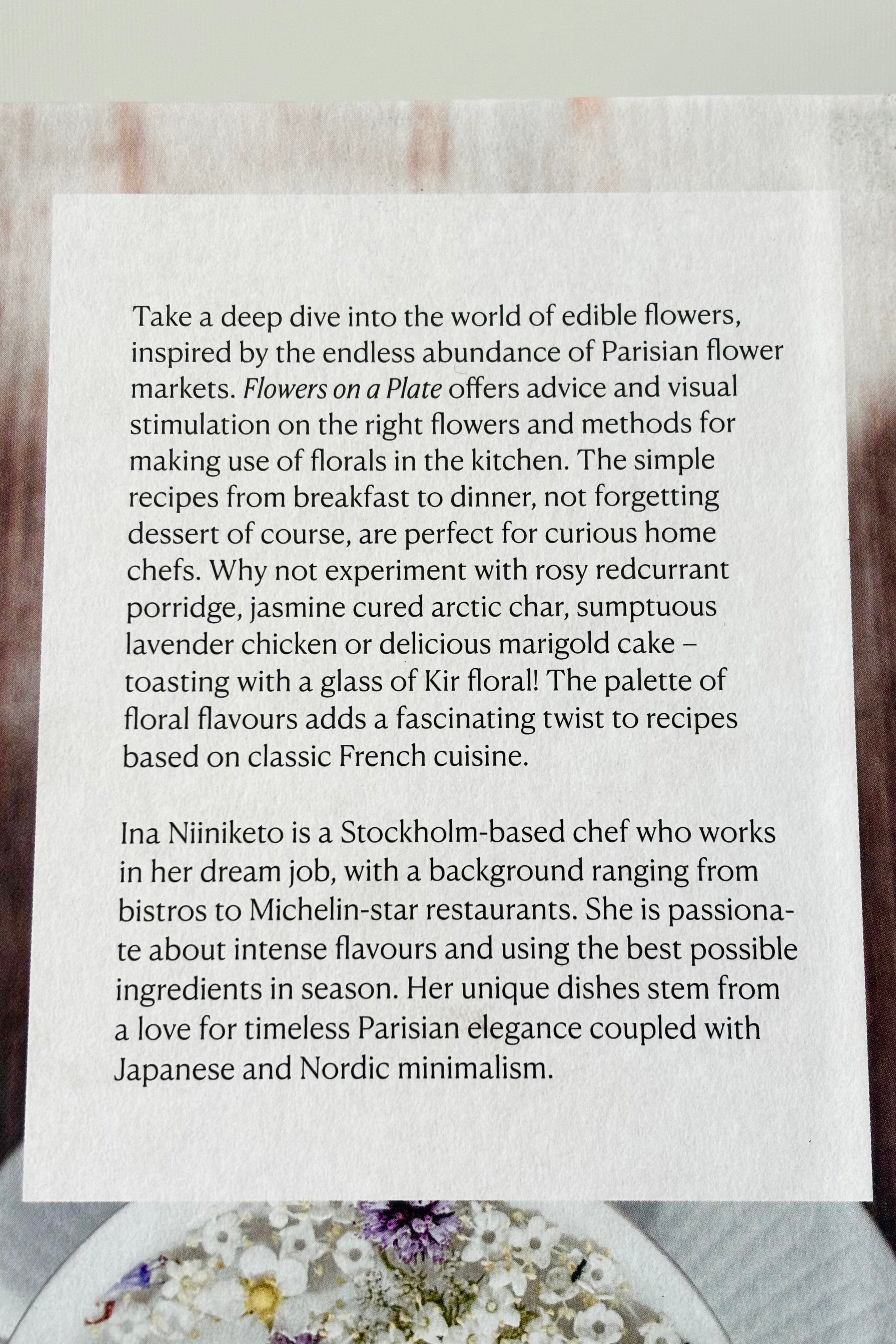 Back cover of 'Flowers on a Plate' book showing book description in black lettering against a white background.