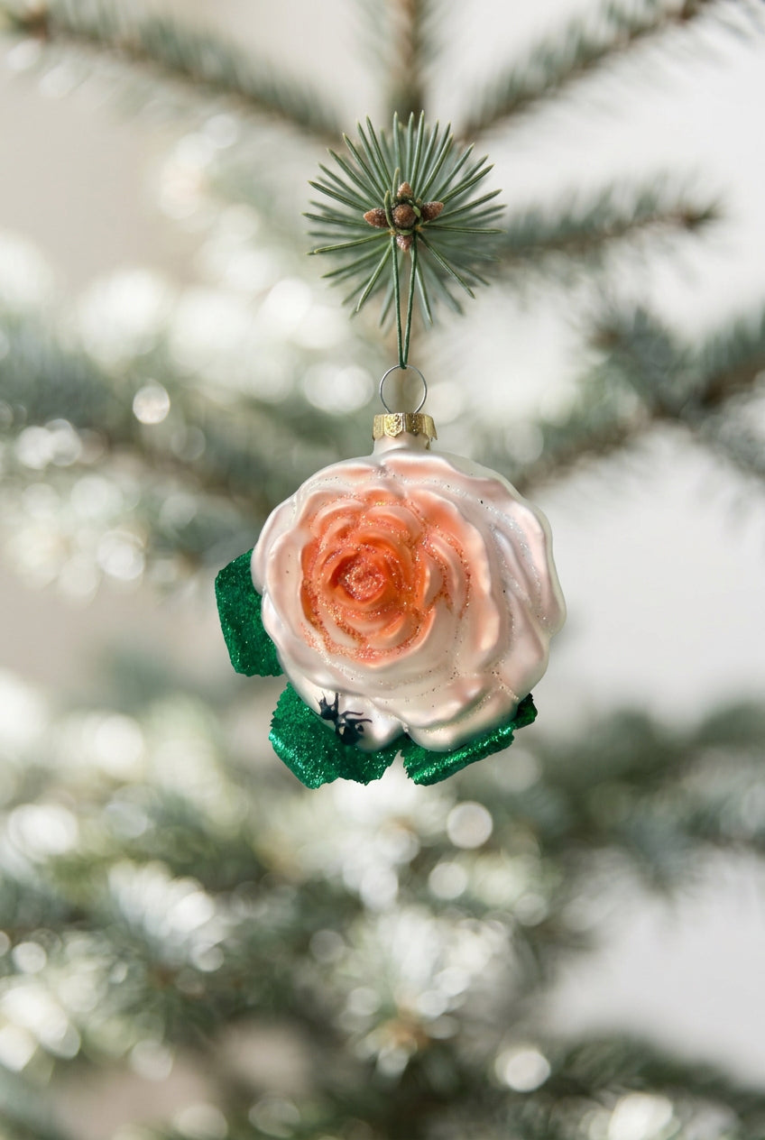 Cottage Rose Ornament hanging from a xmas tree with a white background ©Sprout Home