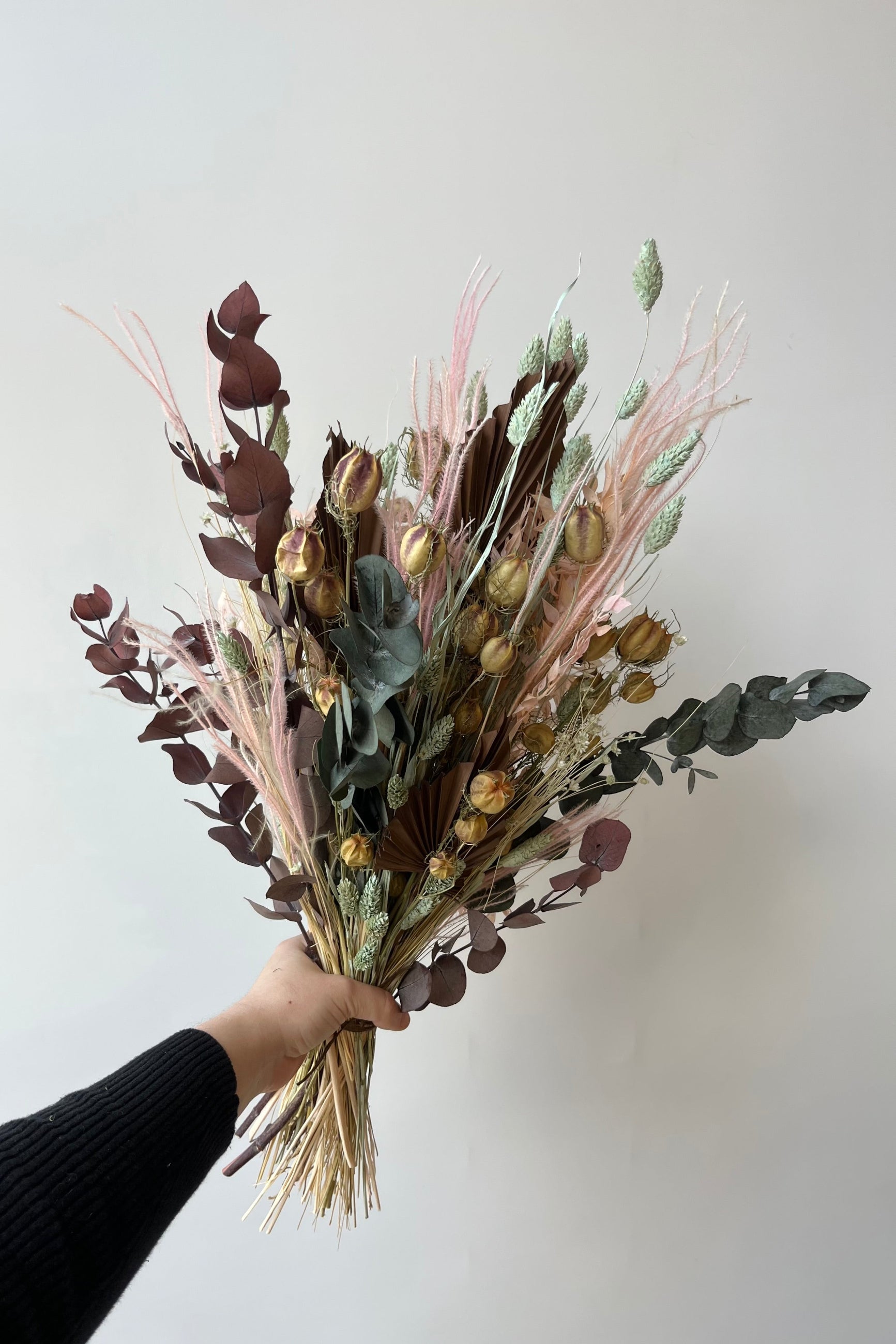 Faerie preserved floral arrangement in shades of mint, pink and off white. ©Sprout Home #size_$85