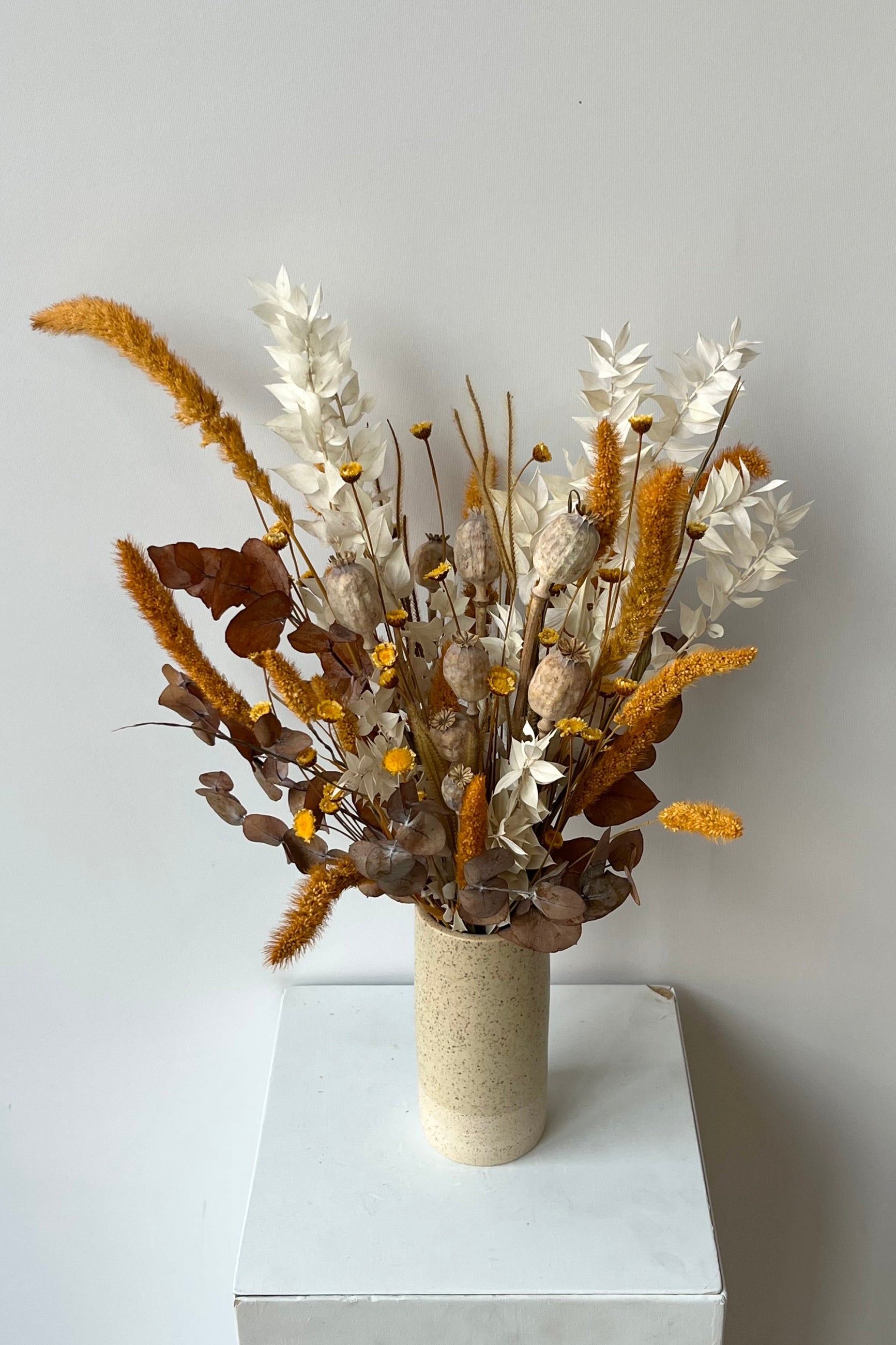 Different types of dried floral with the colors yellow, white in a Little Fire Vase. ©Sprout Home #size_$85