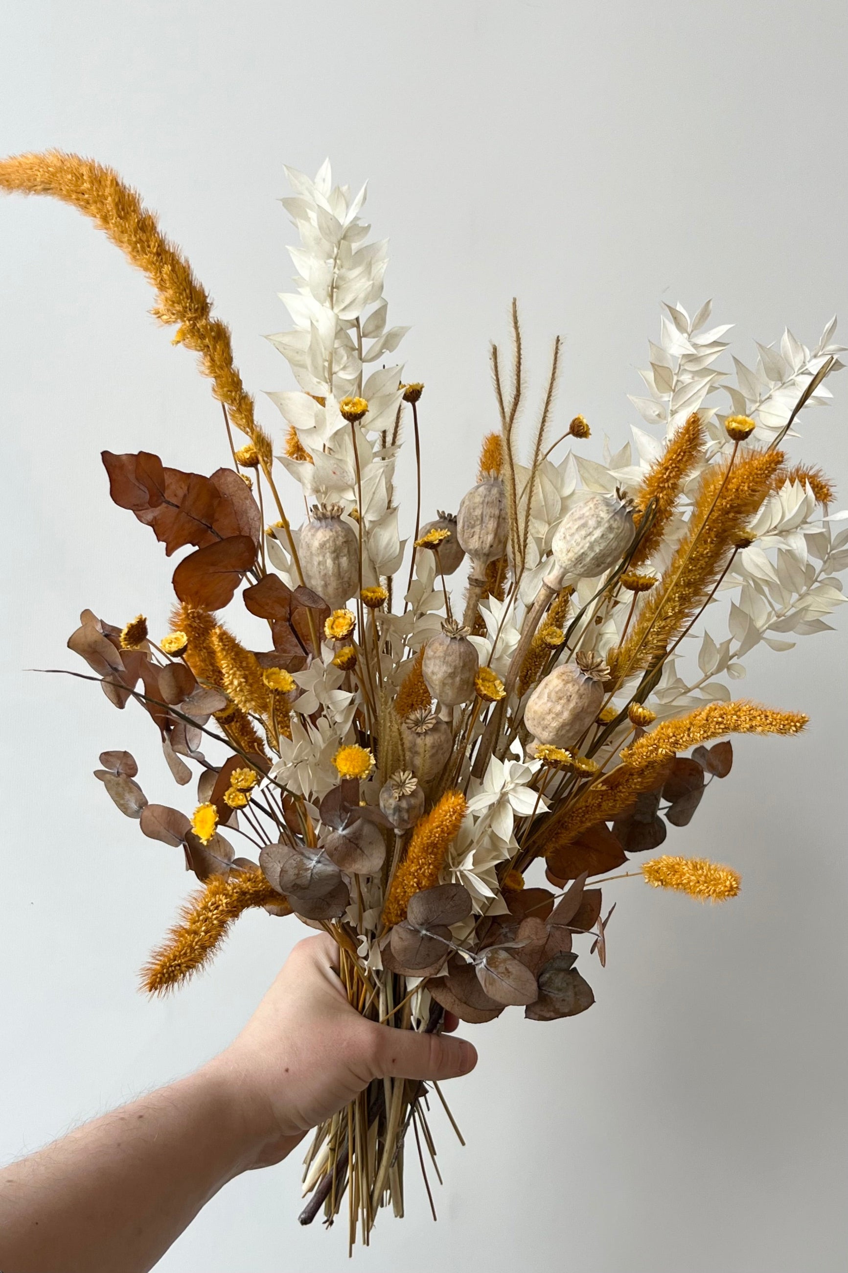 Different types of dried floral with the colors yellow, white and tan in front of white background custom made and called Golden Hour ©Sprout Home #size_$85