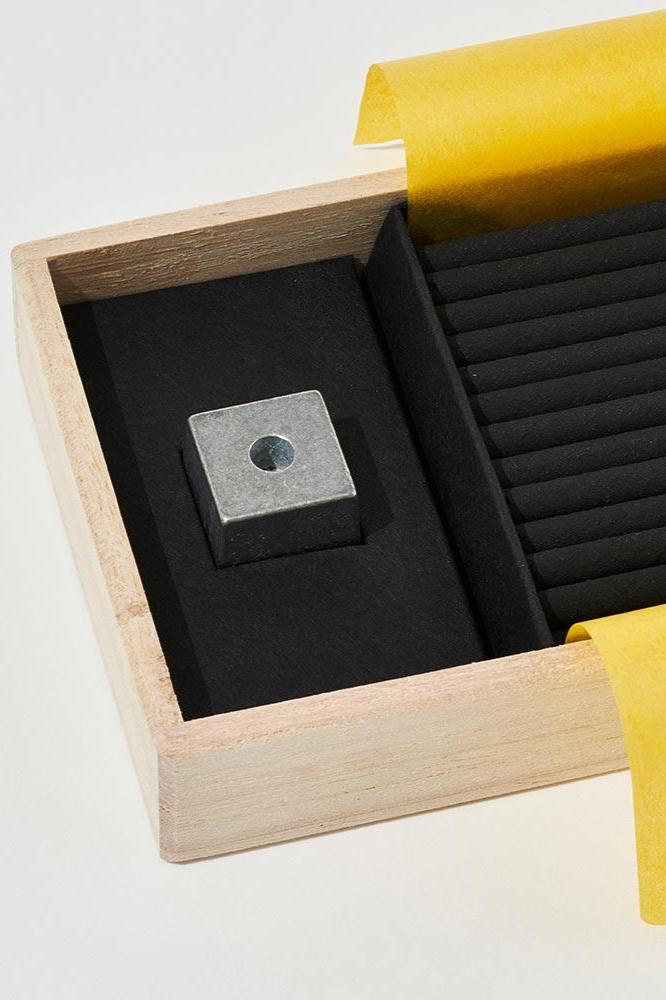 Elemense Suou Incense shown with its packaging slightly open from the bottom detail