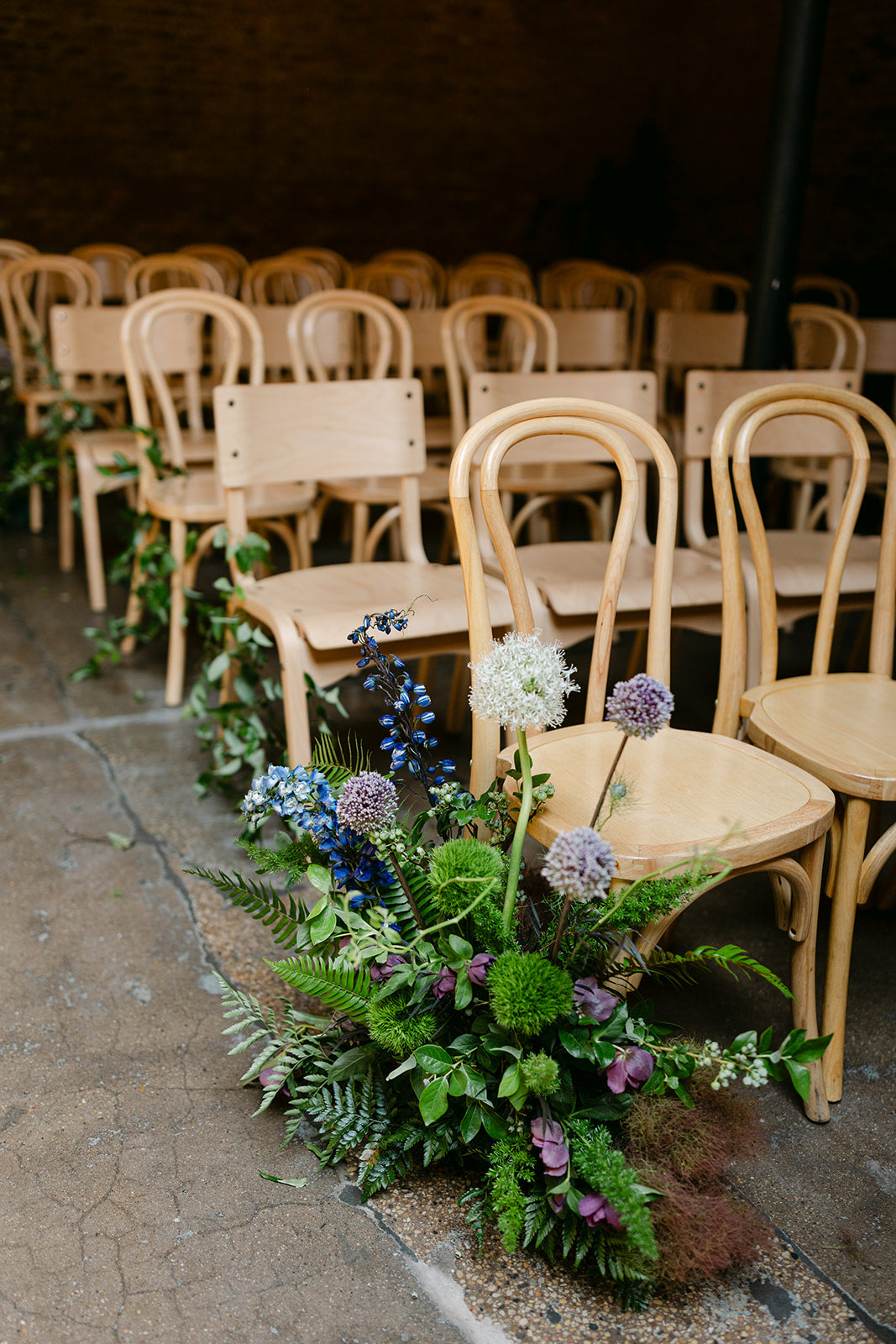 Woodland and dark floral wedding Aisle arrangement by Sprout Home at The Arbory in Chicago ©Devae Photography