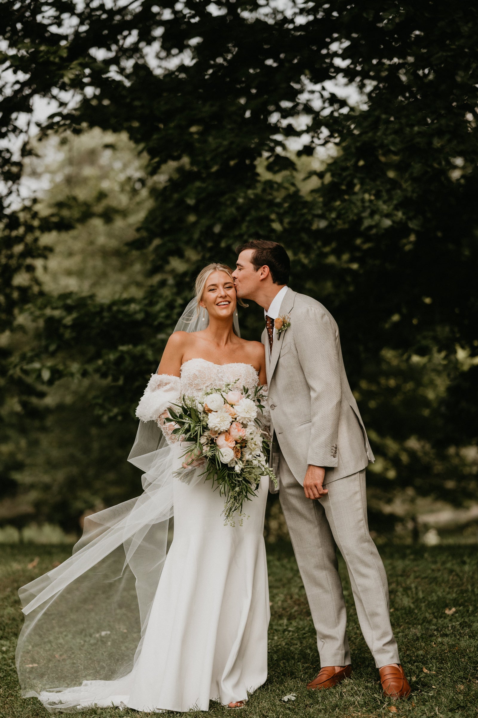 Bridal bouquet and bout in warm pastel and whites by Sprout Home for Kathryn & Conner. Photographed by Lauren Dixon Photo