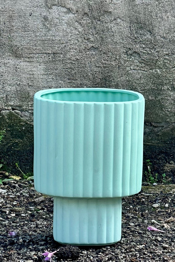 The Mint Modular Stack Planter by Angus & Celeste against a concrete wall at Sprout Home.