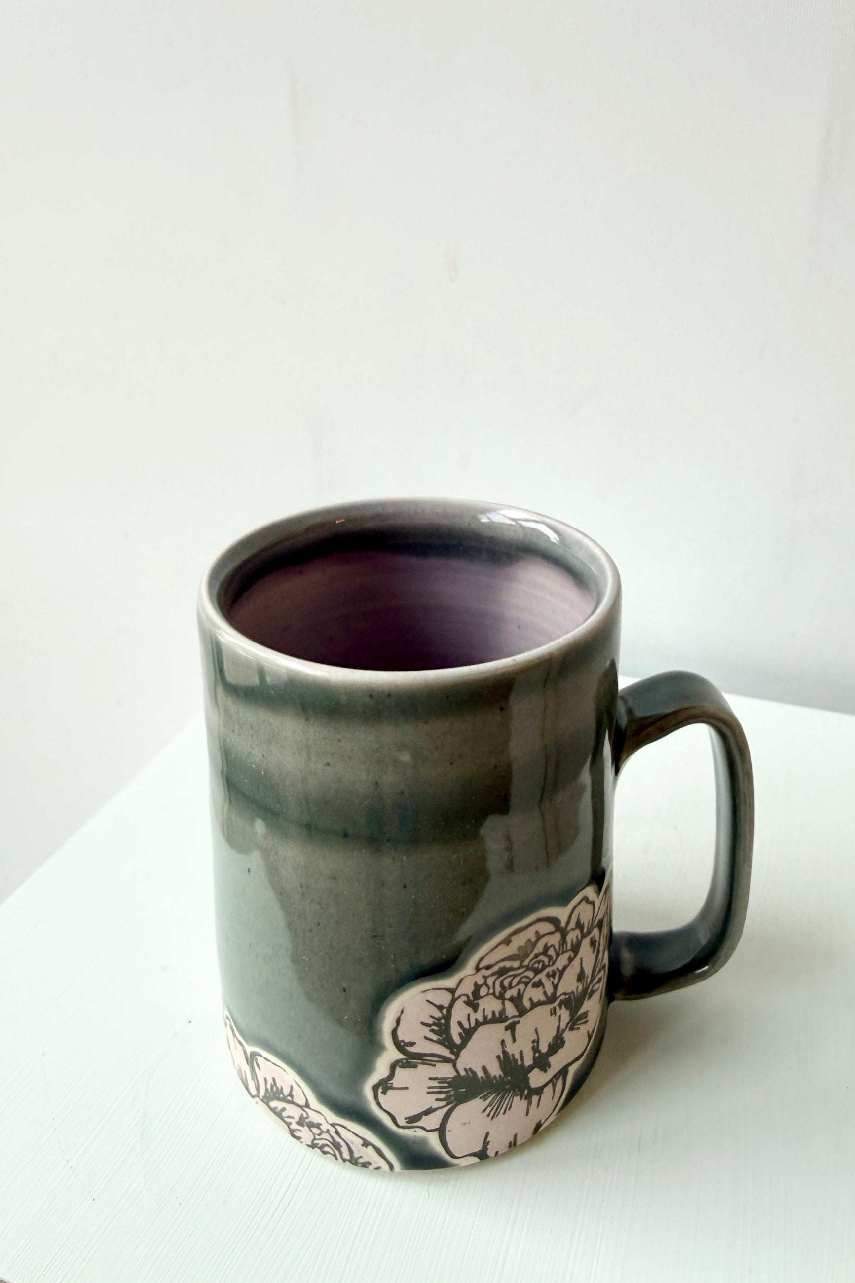 Gray peony ceramic mug with floral design by City in Bloom Ceramics on a white background @Sprout Home