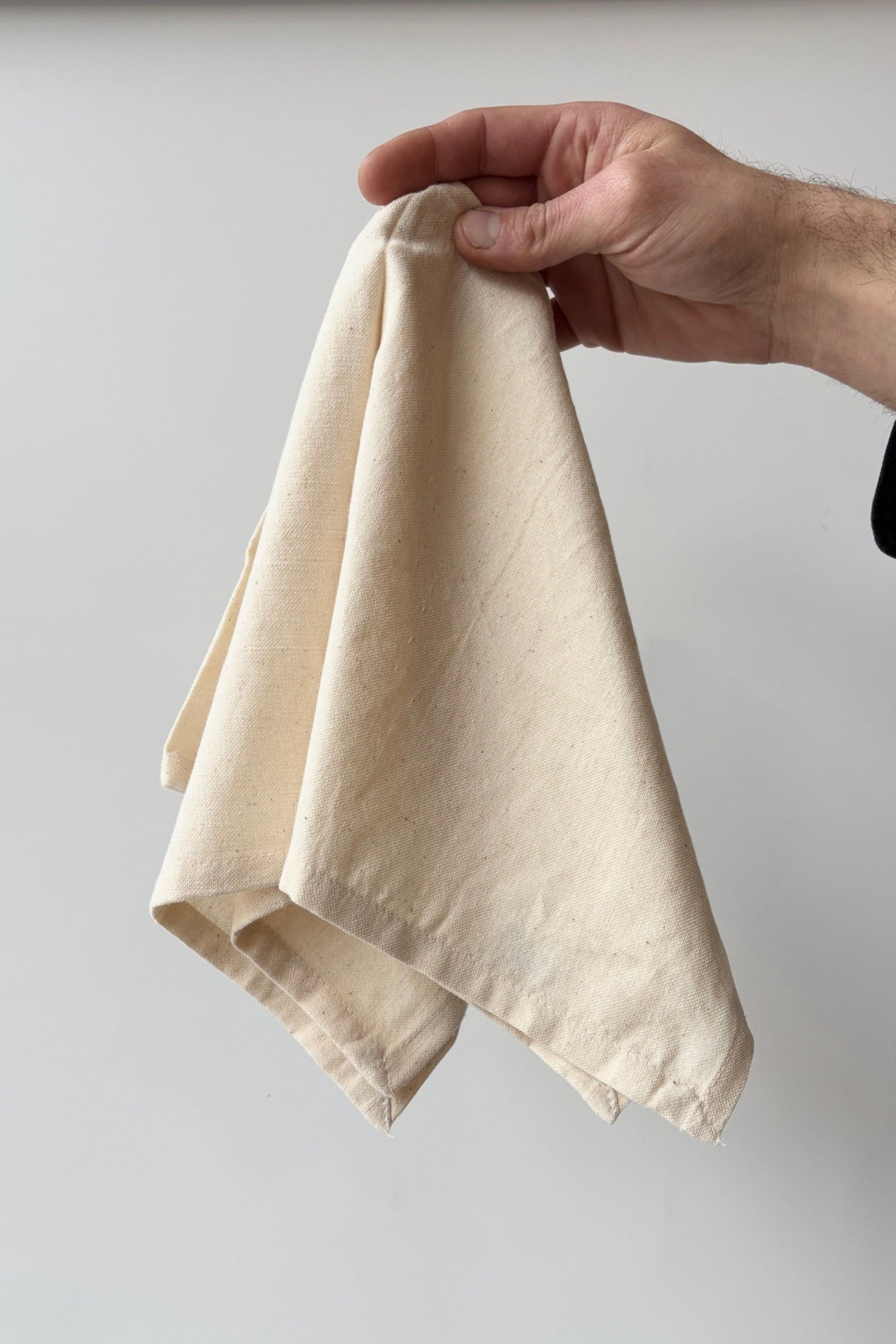100% cotton, homespun, handwoven napkin in color natural against a white backgound ©Sprout Home