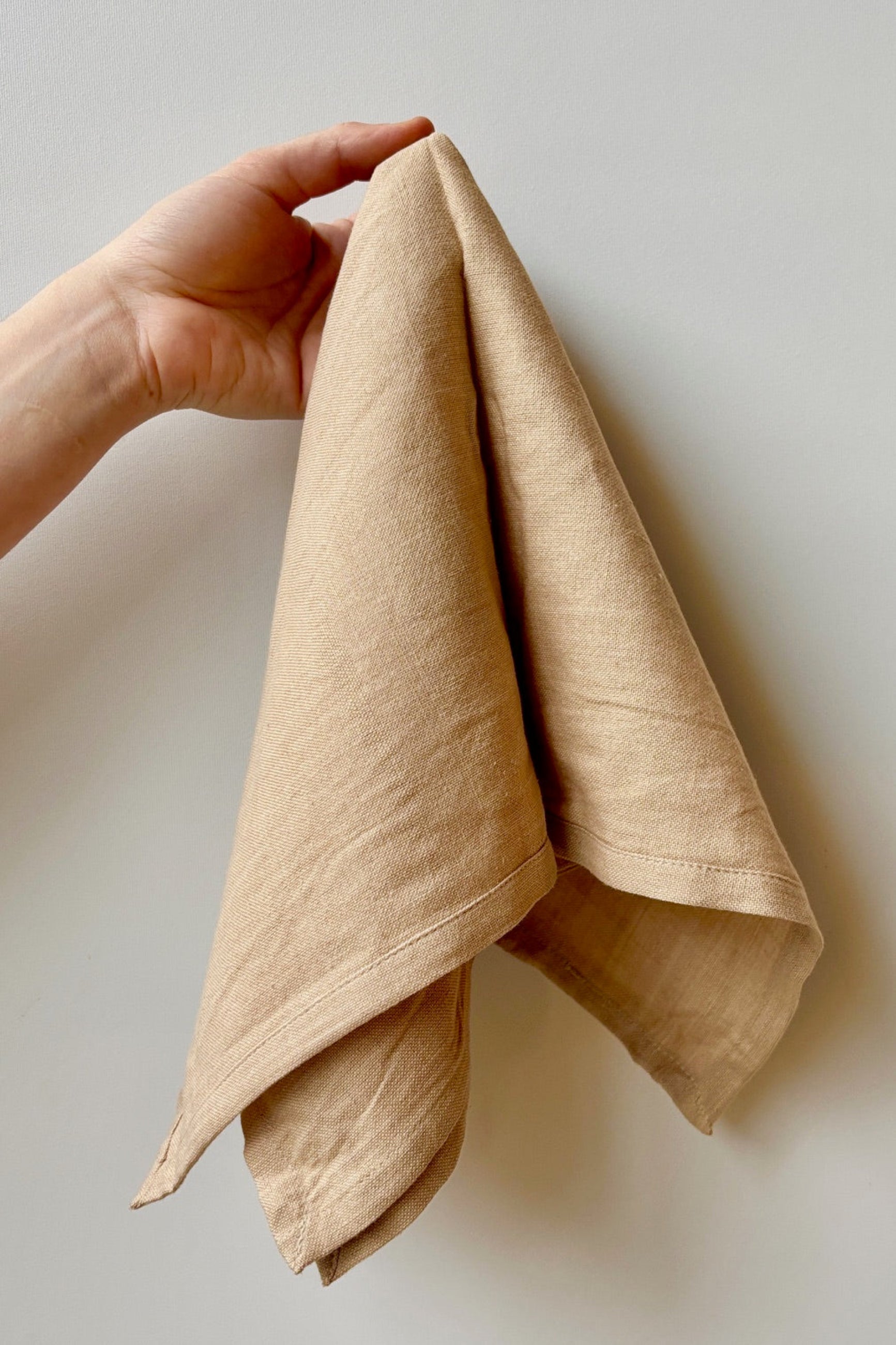 100% cotton, homespun, handwoven napkin in color sand against a white backgound ©Sprout Home