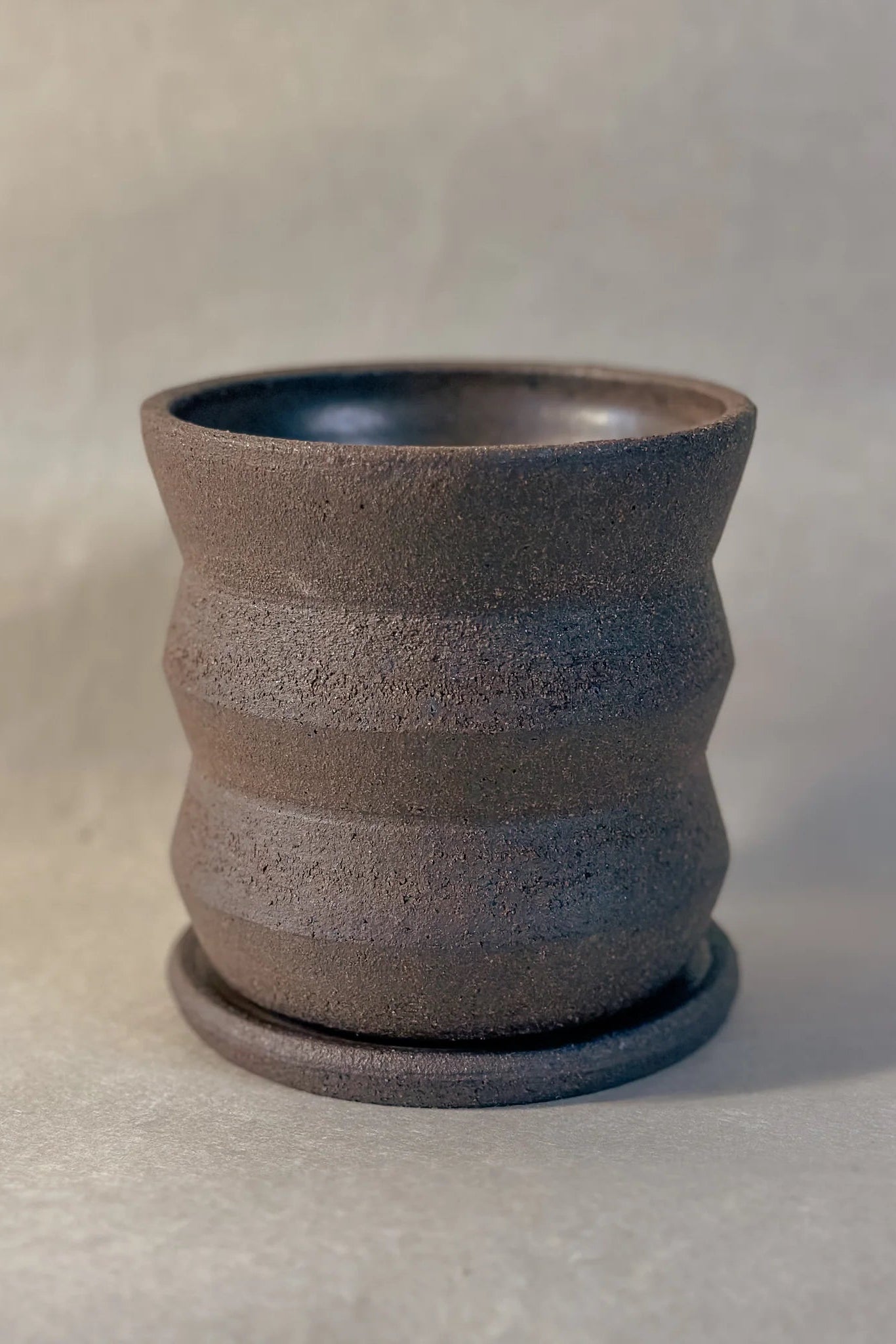 Textured ceramic angled planter on a plain background by Olivia Snow Ceramics ©Olivia Snow Ceramics