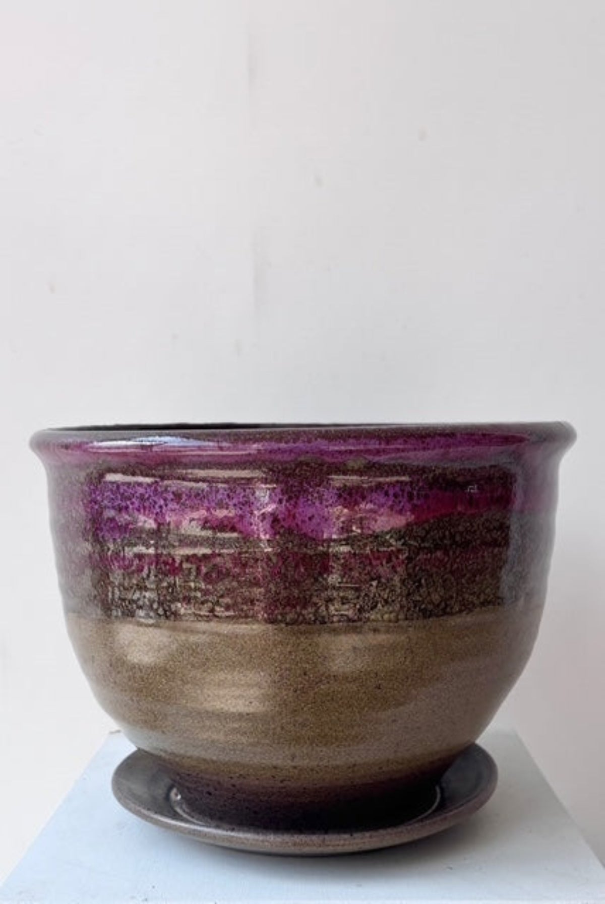Moss and lilac planter with drainge against a white background ©Sprout Home