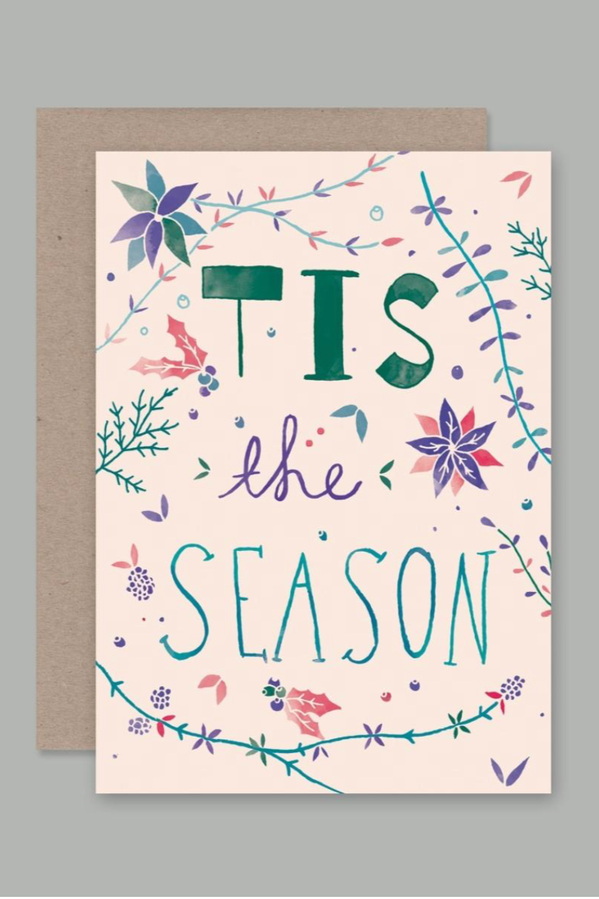 Tis the Season card by AHD featuring a pink background and "Tis the Season' written in various fonts.